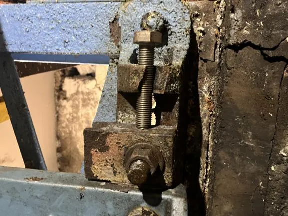 A drive tensioner found broken at the motor end during inspection.