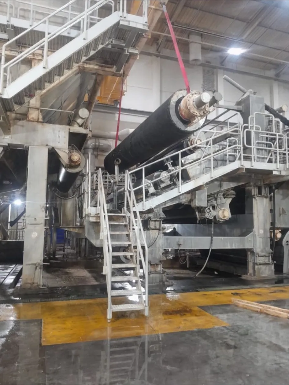 A bearing housing and drive assembly on the machine platform during a roll change.
